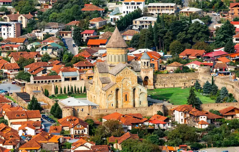 Svetitskhoveli Cathedral and the terracotta rooftops of Mtskheta