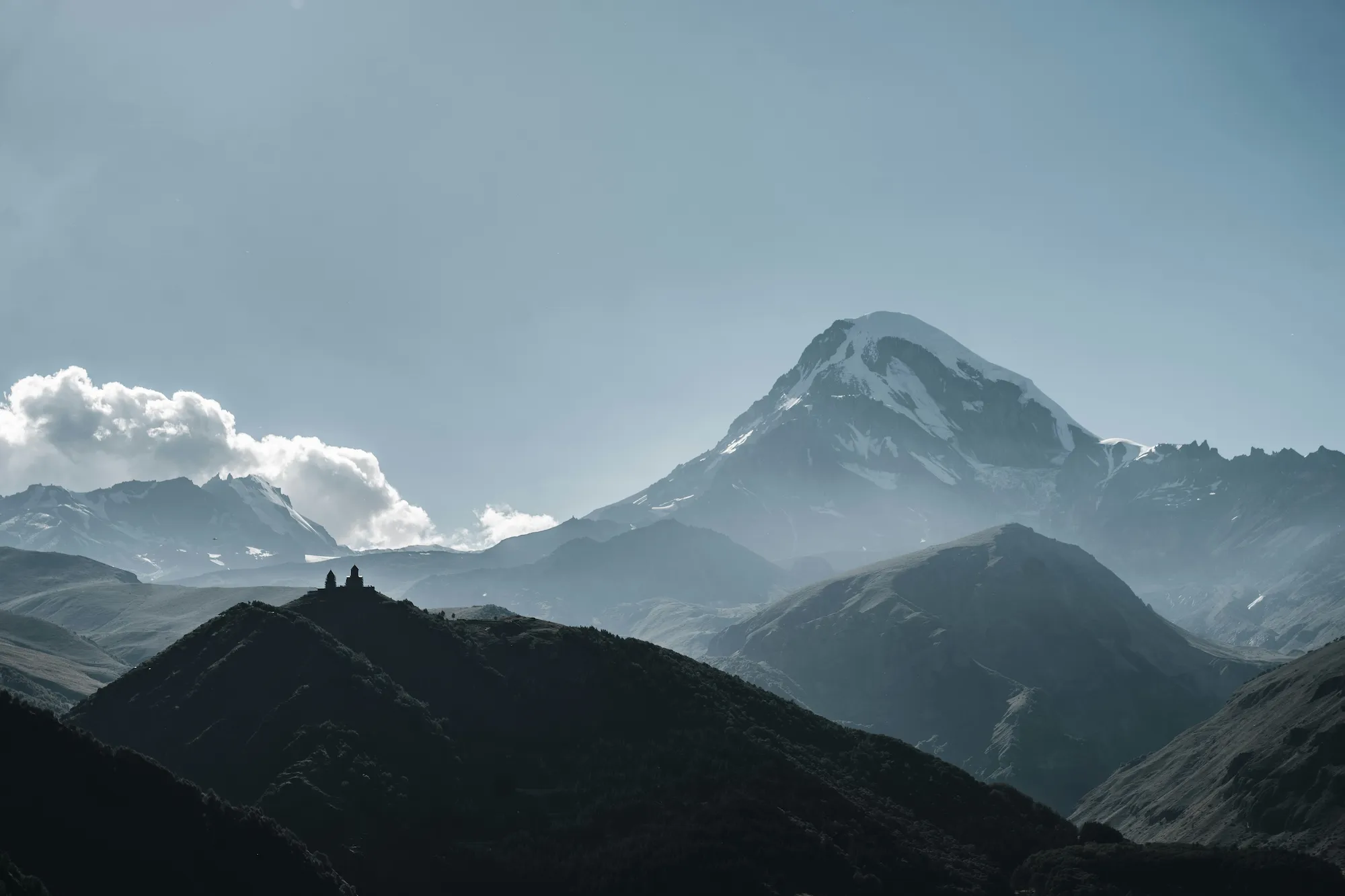 Gergeti Trinity Church with Mount Kazbek in the background, Stepantsminda, Georgia