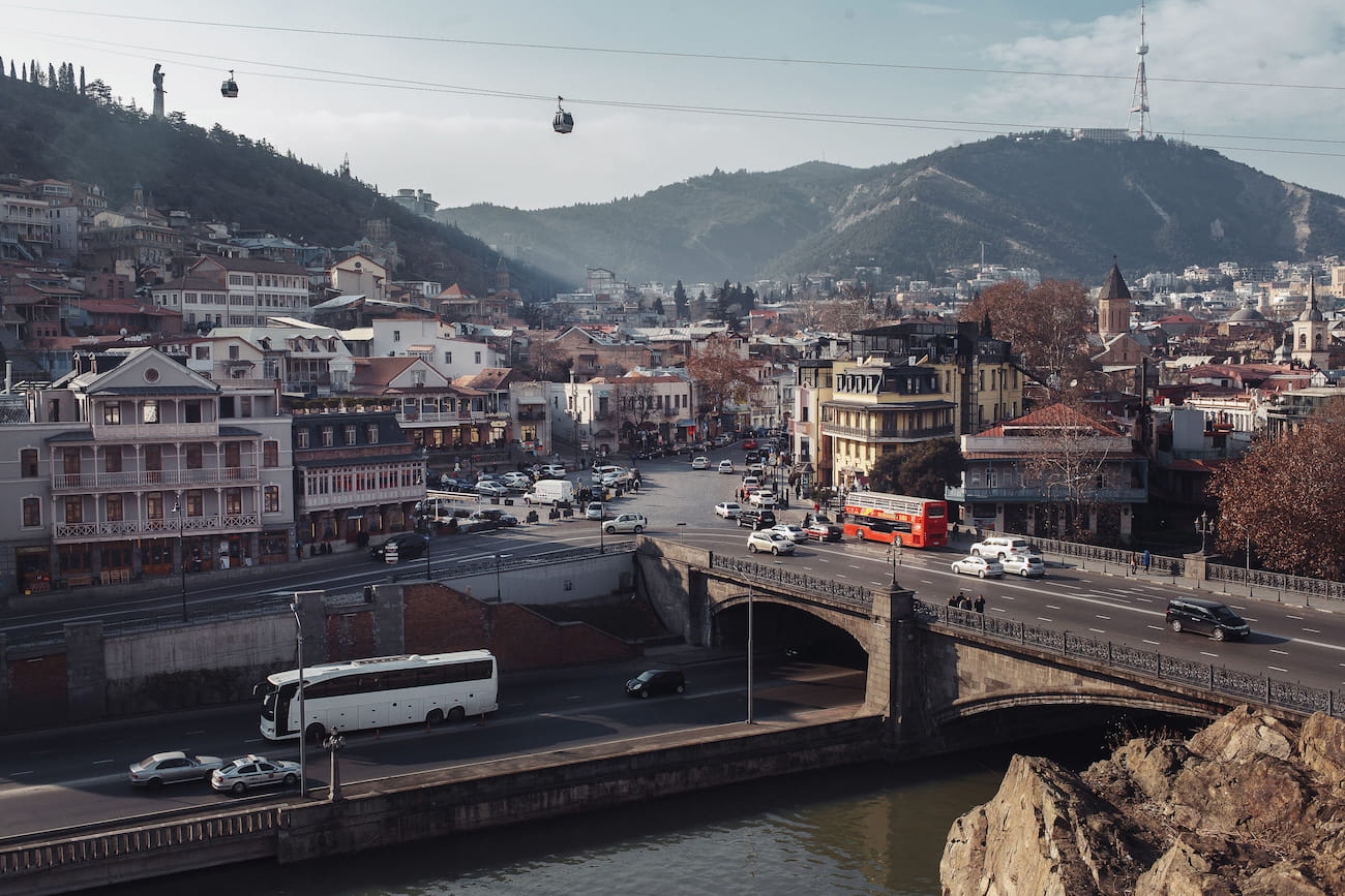 Tbilisi old town cliffside buildings above the Kura River